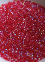 Load image into Gallery viewer, Transparent A.B Red Charlotte Beads 11/0
