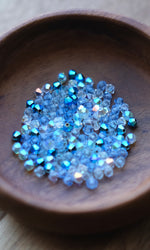 Load image into Gallery viewer, Blue Cotton Candy Swarovski Bicone Mix 4mm
