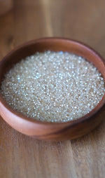 Load image into Gallery viewer, Crystal Silver Lined Honey Charlotte Beads 11/0

