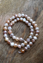 Load image into Gallery viewer, Seashell Luster Freshwater Pearl Strand (7-8mm)
