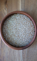 Load image into Gallery viewer, Crystal Silver Lined Honey Charlotte Beads 11/0
