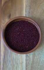 Load image into Gallery viewer, Frosted Garnet Charlotte Beads 11/0

