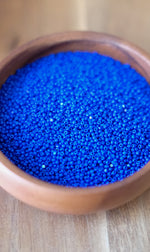Load image into Gallery viewer, Opaque Medium Blue Charlotte Beads 11/0
