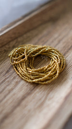 Load image into Gallery viewer, 11/0 Gold Metallic Hank
