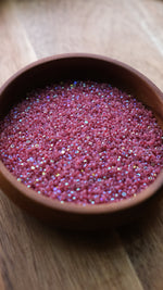 Load image into Gallery viewer, Patina Opal Neon Red Aurore Boreale Charlotte Beads 11/0
