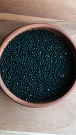 Load image into Gallery viewer, Matte Deep Green Transparent Charlotte Beads 11/0
