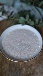 Load image into Gallery viewer, 11/0 Patina White Opal Charlotte Beads
